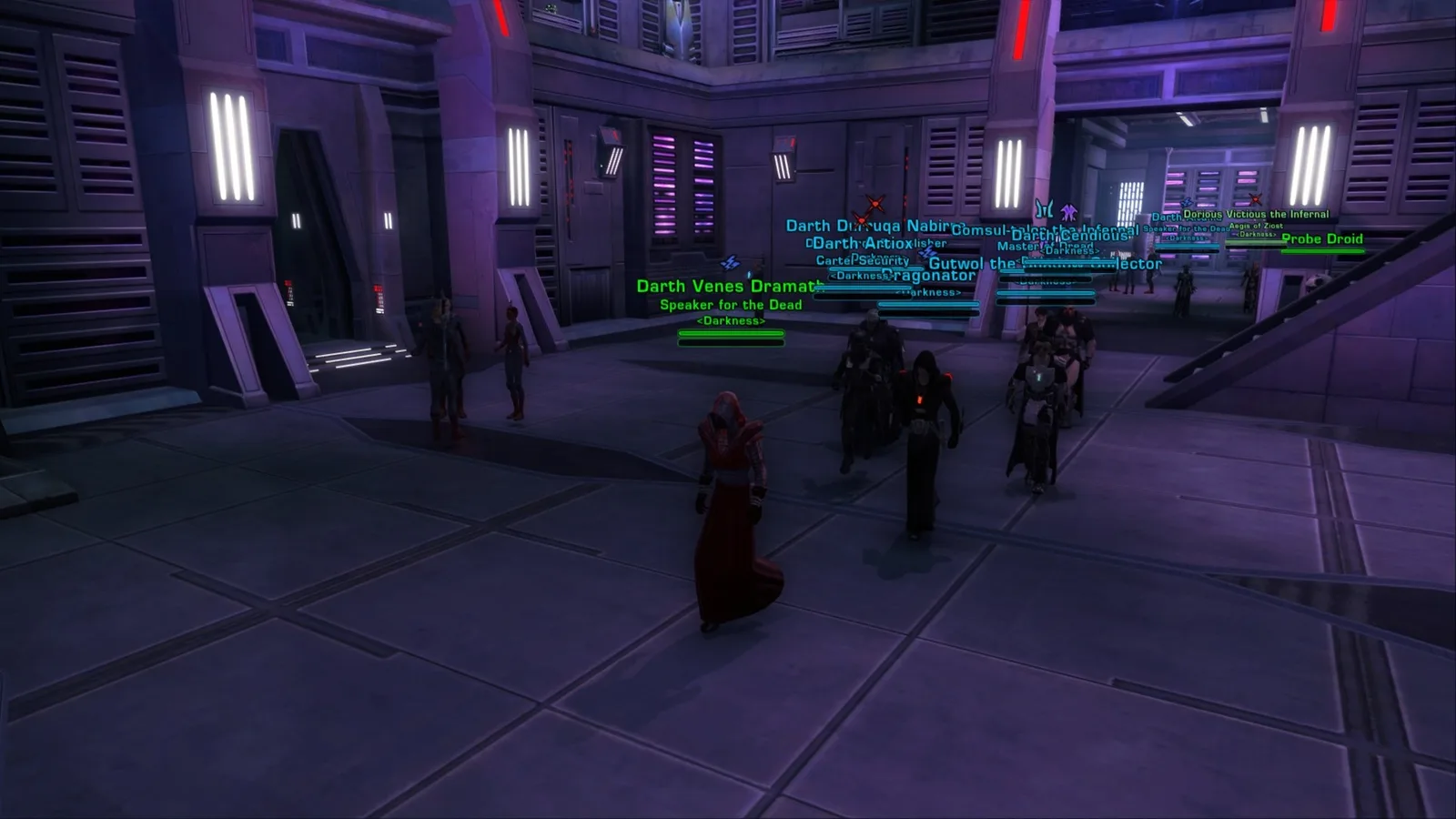 Guild members walking through the Sith Academy on Korriban, nameplates showing